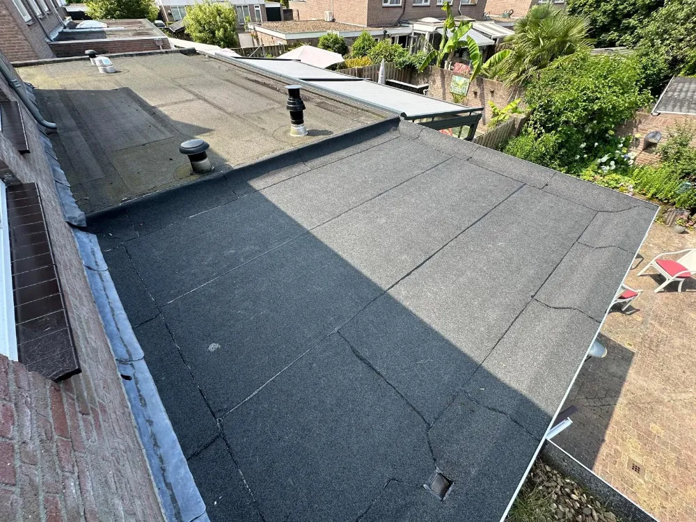Platte Daken 7 Gerenoveerde platte daken bij woningen